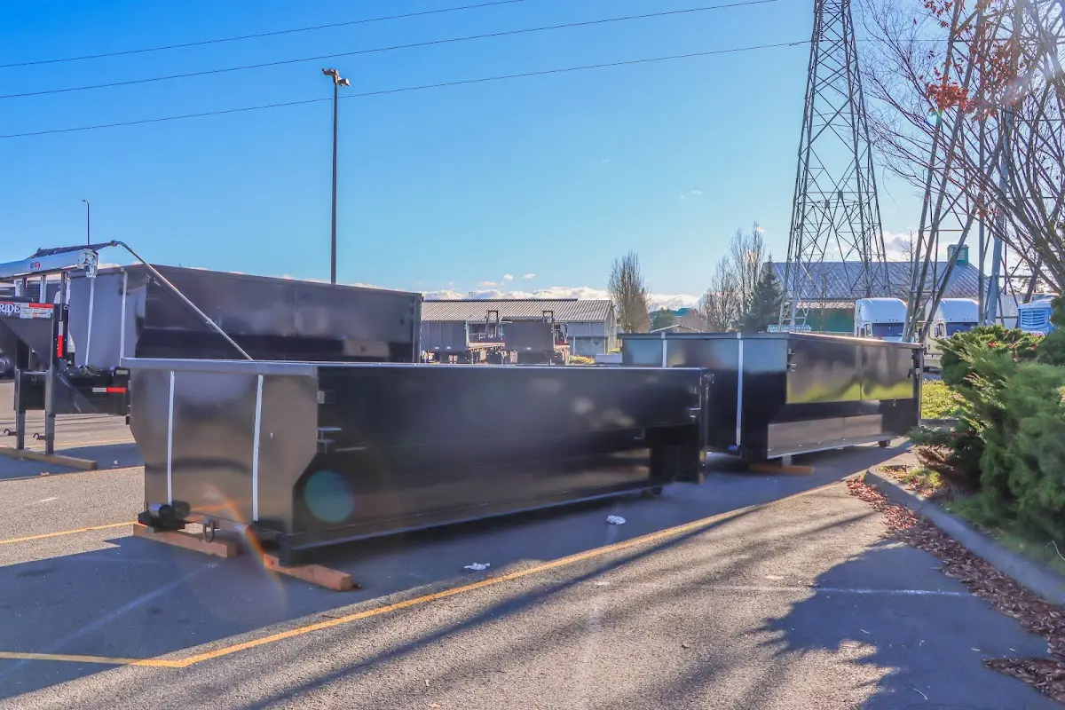 Roll-off dumpster ready for waste disposal at job site for Demolition Dumpster Rental in Binghamton